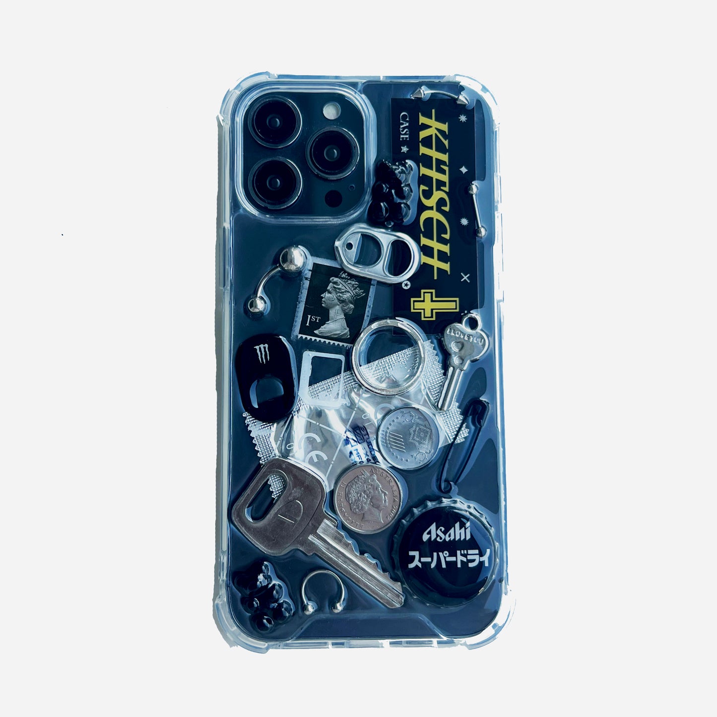 Gothic grunge black junk phone case featuring punk charms and chains on a high-contrast white background